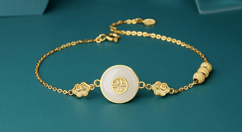 Charm ngọc đồng điếu